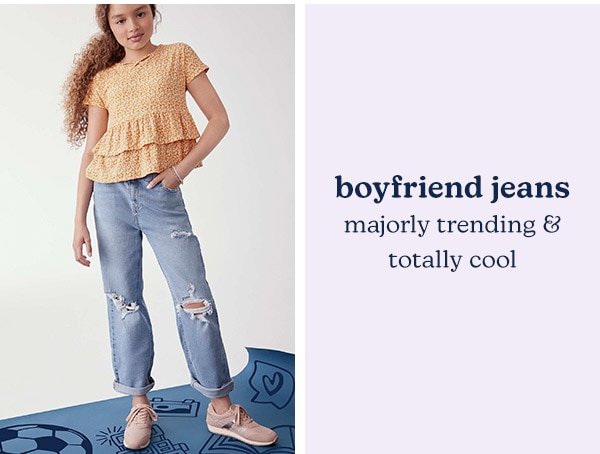 Boyfriend jeans. Majorly trending & totally cool. Model wearing evsie clothing.
