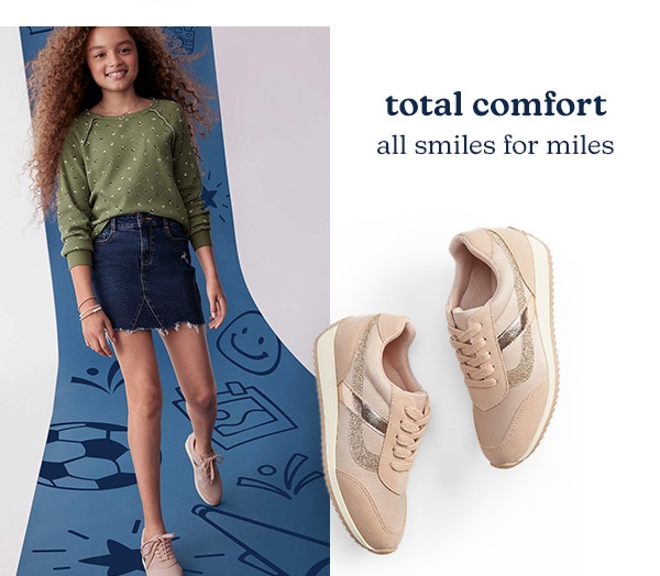 Total comfort. All smiles for miles. Model wearing evsie clothing.