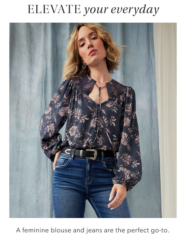 Elevate your everyday. A feminine blouse and jeans are the perfect go-to. Model wearing maurices clothing.