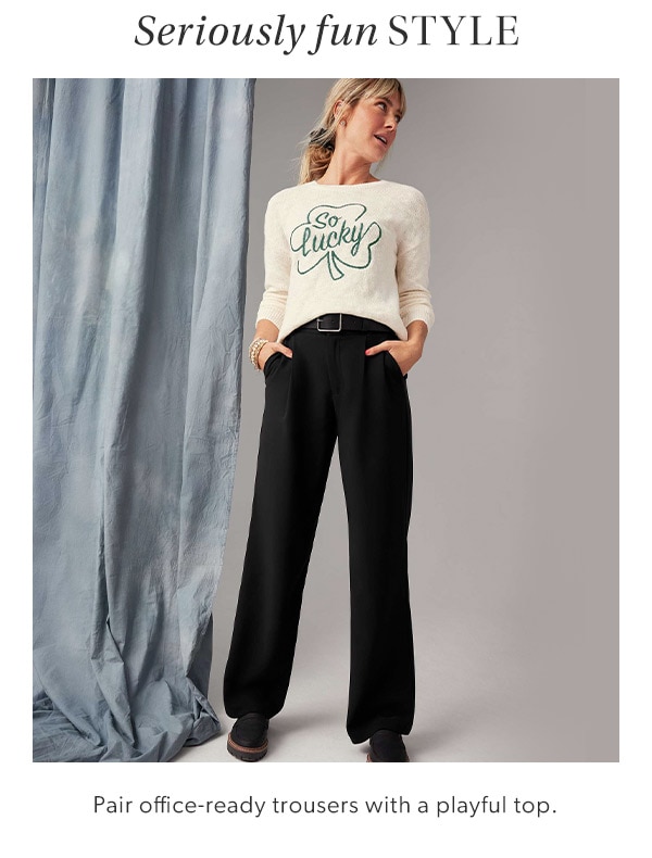 Seriously fun style. Pair office-ready trousers with a playful top. Model wearing maurices clothing.