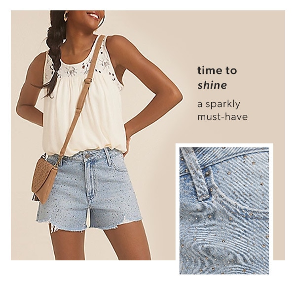 Time to shine. A sparkly must-have. Model wearing maurices clothing.