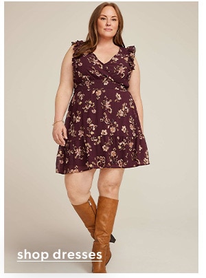 Shop dresses. Model wearing maurices clothing.