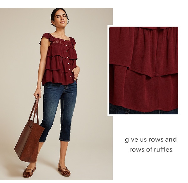 Give us rows and rows of ruffles. Model wearing maurices clothing.