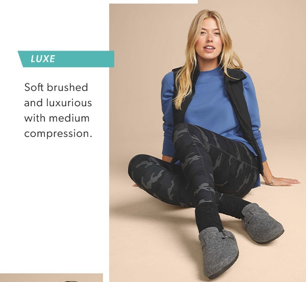 Luxe. Soft brushed and luxurious with medium compression. Model wearing maurices clothing.